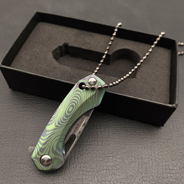 

green tc4 alooy titanium alloy damascus blade folding pocket knife