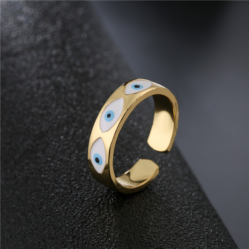 

Fashion Young Ladies 18K Gold Plated White Enameled Evil Eye Ring Jewelry Wholesale