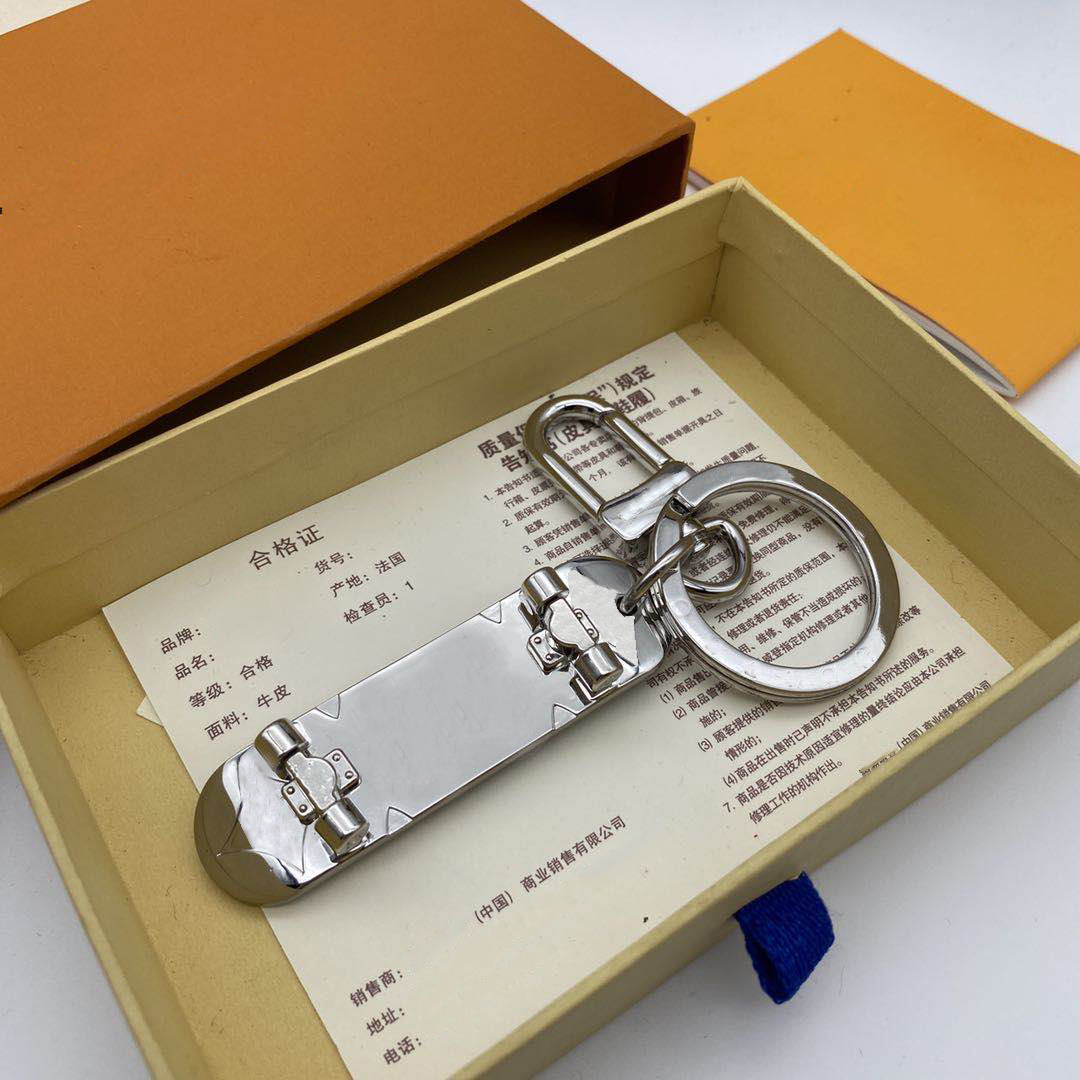 

2021 Luxury keychains designer unisex key chain real leather with stainless steel keychain good nice, Silver