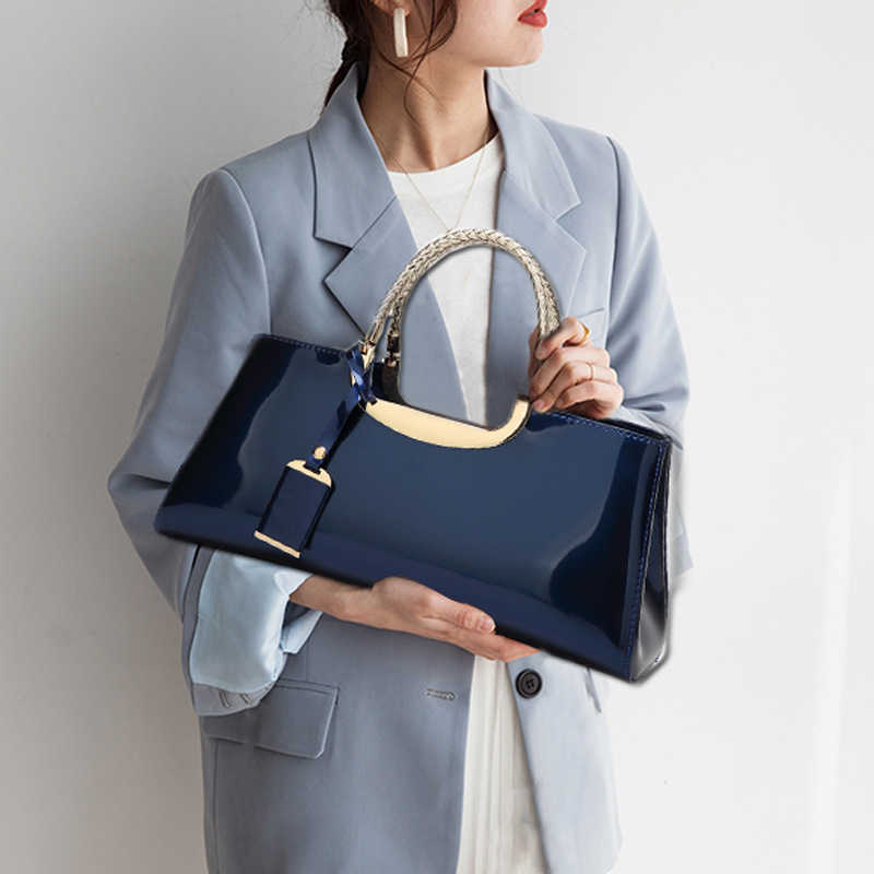 

2021 fashion light glue patent leather hand-held women's single shoulder wedding bride's banquet bag Guangzhou, White