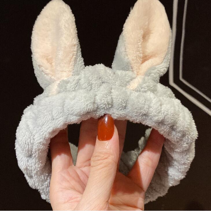 

Autumn and winter new plush headdress Korean women make up wash face loose wide edge cartoon flannel rabbit ear hair band