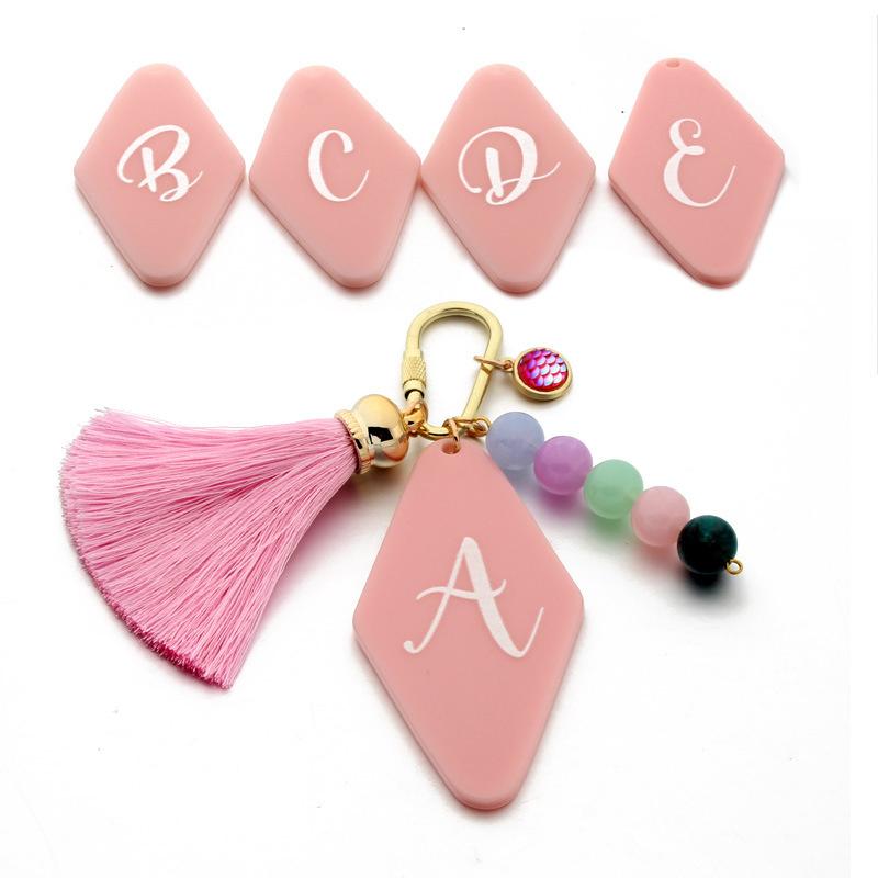 

Keychains 26 Alphabet Keychain For Women Tassel Car Charms Pink Beads Keyring Keys Accessories Christmas Gift Wholesale