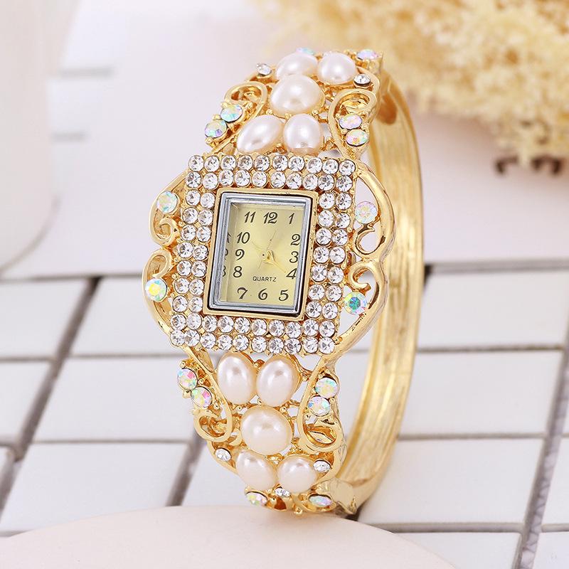

Wristwatches Fashion Middle East Pearl Diamond Bangle Watch Hollow Bracelet Watches Factory Direct Sales, Gold