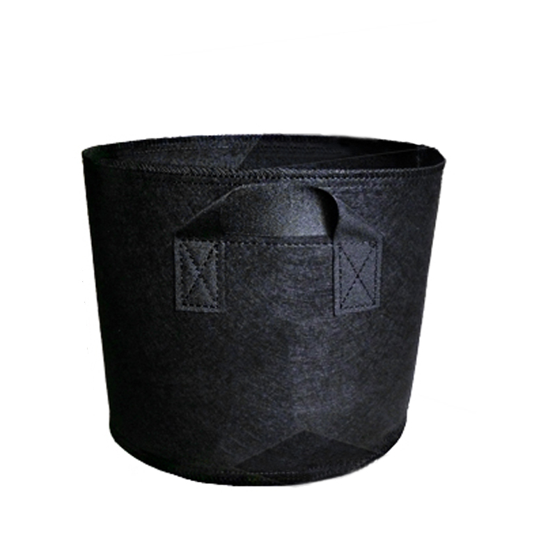 Non Woven Tree Fabric Pots Grow Bag Root Container Plant black hand with planting flowers nonwoven bags Grows Culture-image-690345080