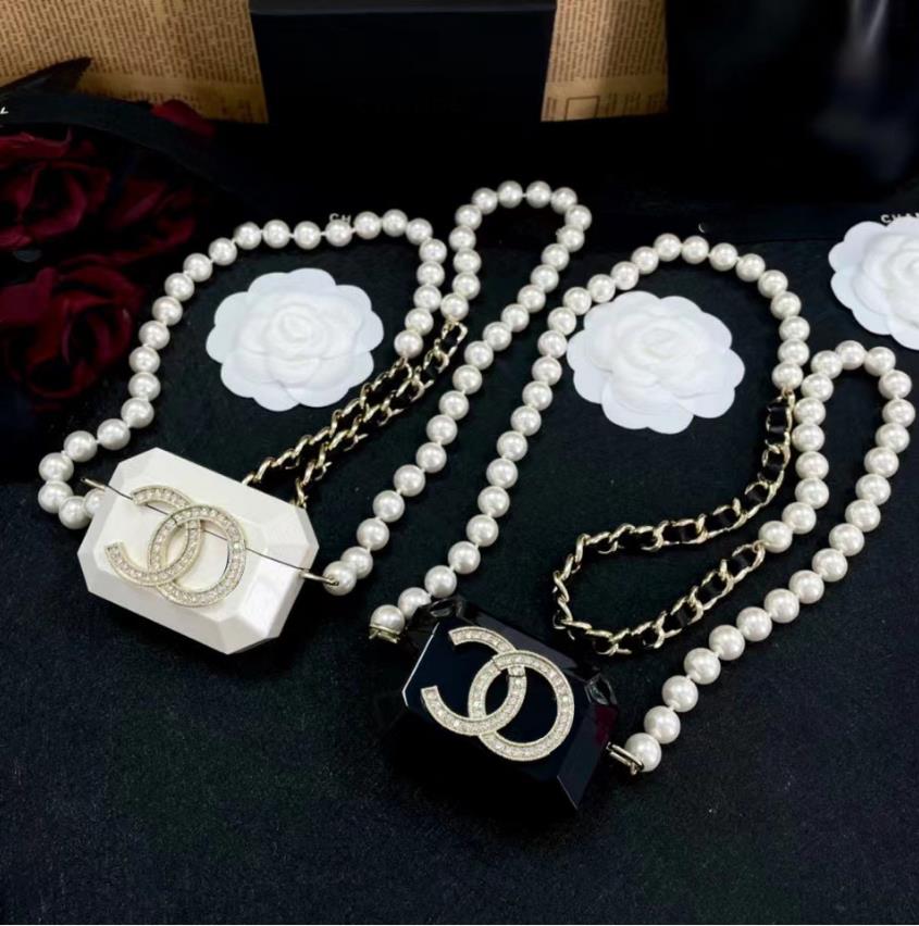 

2021 New Pearl resin acrylic earphone cover bag Necklace sweater chain