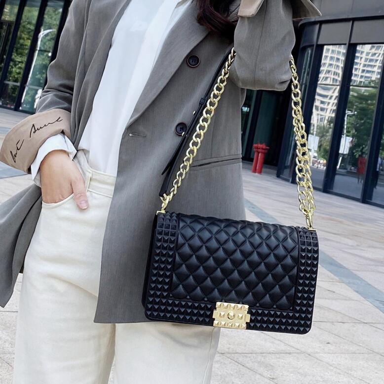 

Wholesale ladies leather shoulder bags in summer small fresh jelly-colored chain bag shaped cross section large ladies handbag clamshell fashion backpack 12 colors, Fuchsia1