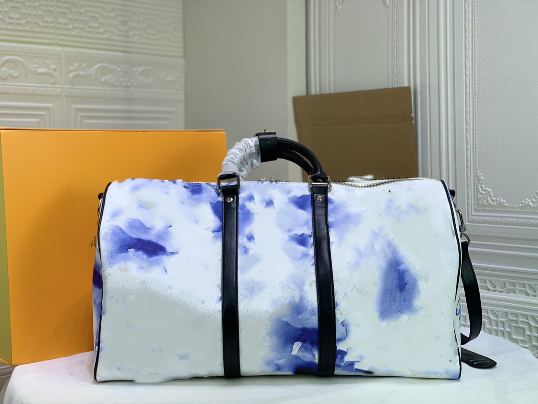 

Designer men and women travel bag large capacity canvas leather fashion top quality soft with Zipper hand-carried shoulder-back available size 50-28-23 cm M57485