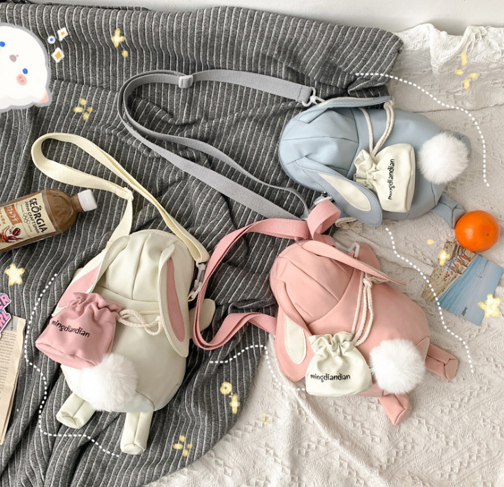 

Sweet kids cartoon rabbit modelling nylon backpack girls letter printed pocket single shoulder bags children plush pompon bunny messenger ch