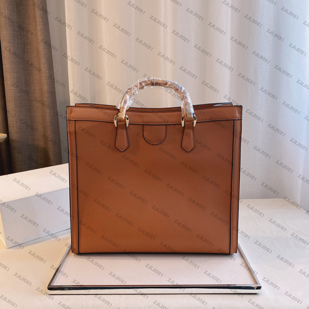 

Luxurys Designers Bags large-capacity portable diagonal shoulder handbag leather slung is available in four colors: 36*13*33cm