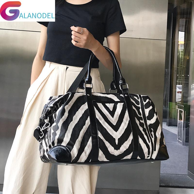 

Duffel Bags Women PU Leather Travel Men Zebra Pattern Luggage Duffle Bag Waterproof Daily Handbags Soft Shoulder Bolso Deporte, Black