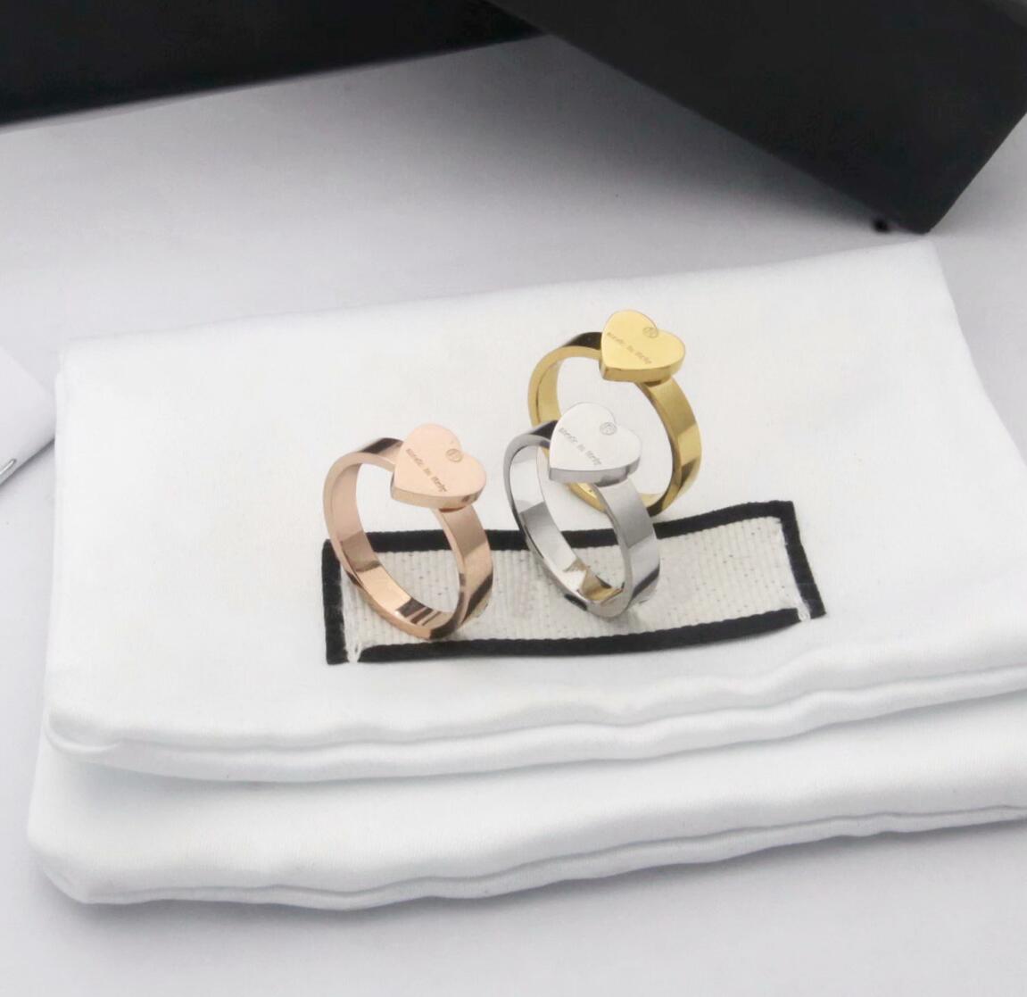 

Europe America Style Ring Men Lady Women Titanium steel Engraved G Letter Heart Lovers Rings Size6-9 Twinkle