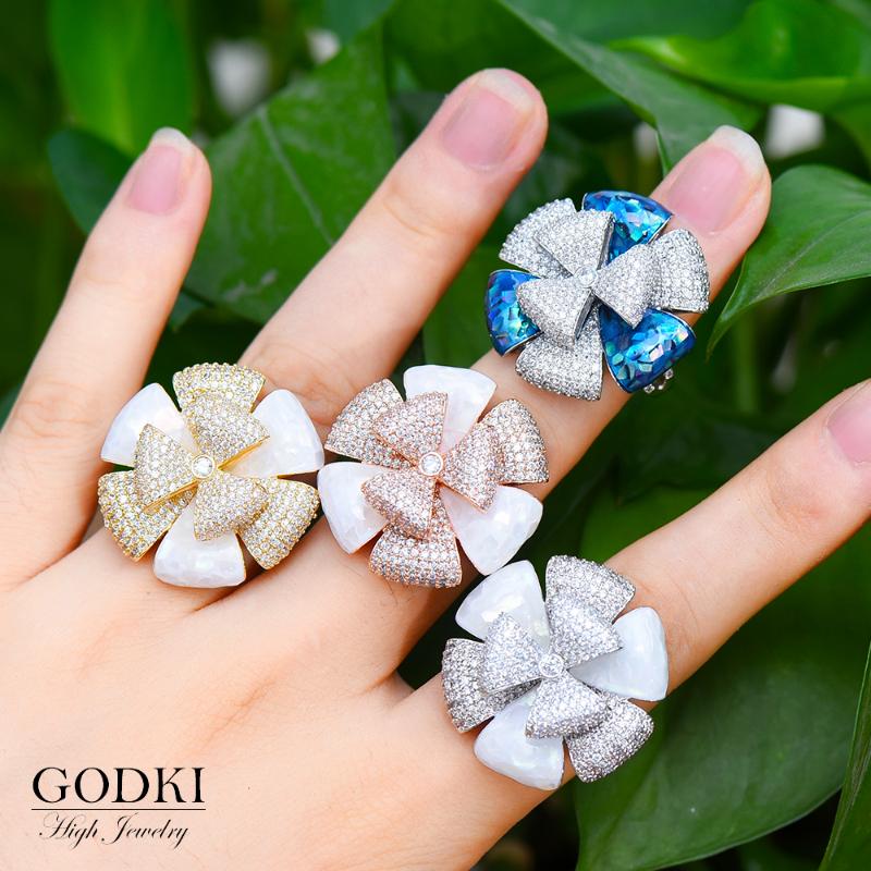 

Luxury Flower Shell Geometry Cubic Zironium Engagement Dubai Naija Bridal Finger Rings Jewelry Addiction Cluster