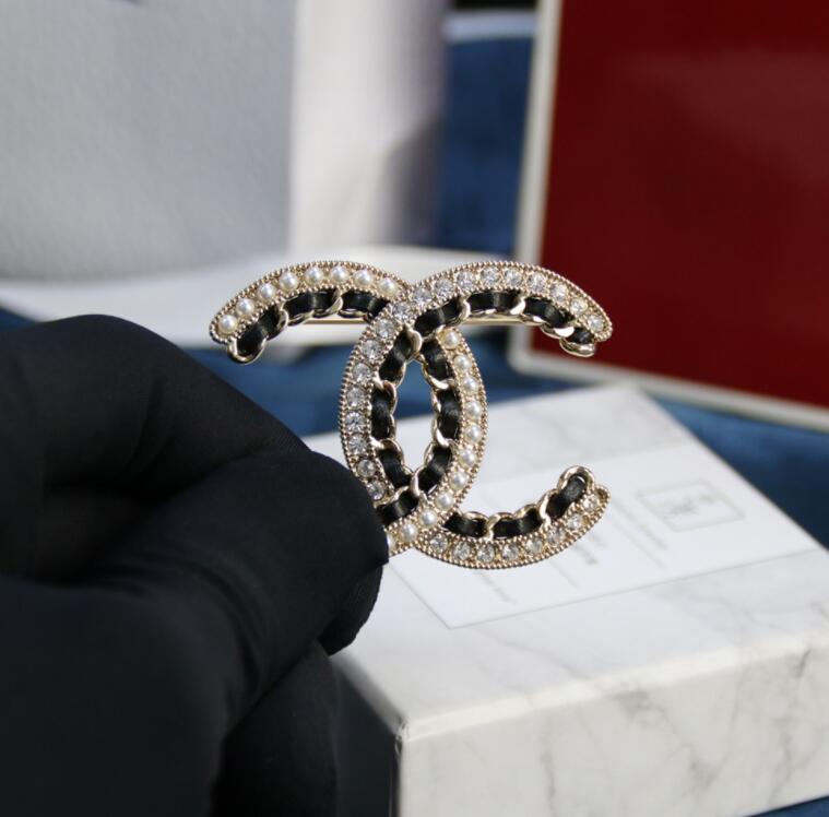 

New letter brooch fashion inlaid with diamond black braided leather rope