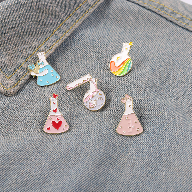 

Beaker Enamel Pins Bottle of Galaxy Rainbow Pink Heart Bowknot Metal Brooches Badges Heart-shaped Pins up Gift for Science Lover