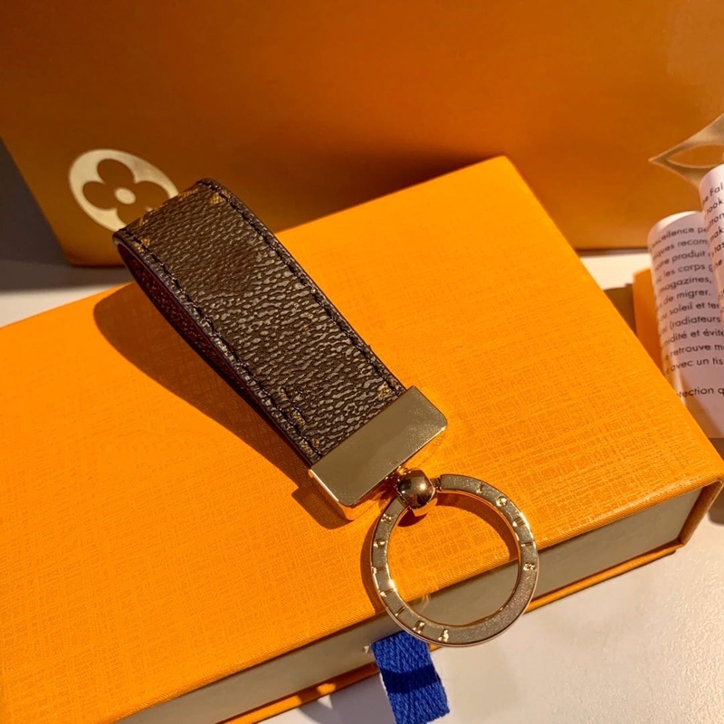 

Wholesale 2021 Luxury Key Buckle lovers Car Keychain Handmade Designer Leather Keychains Men Women Bags Pendant Accessories 10 Colors