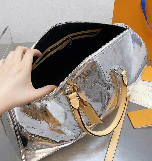 

2020 New Arrival Designer Duffel Bags Men High Quality Leather Travel Bag Luggage weekend bag Day Clutch Gym Bag Purse315n, Silver