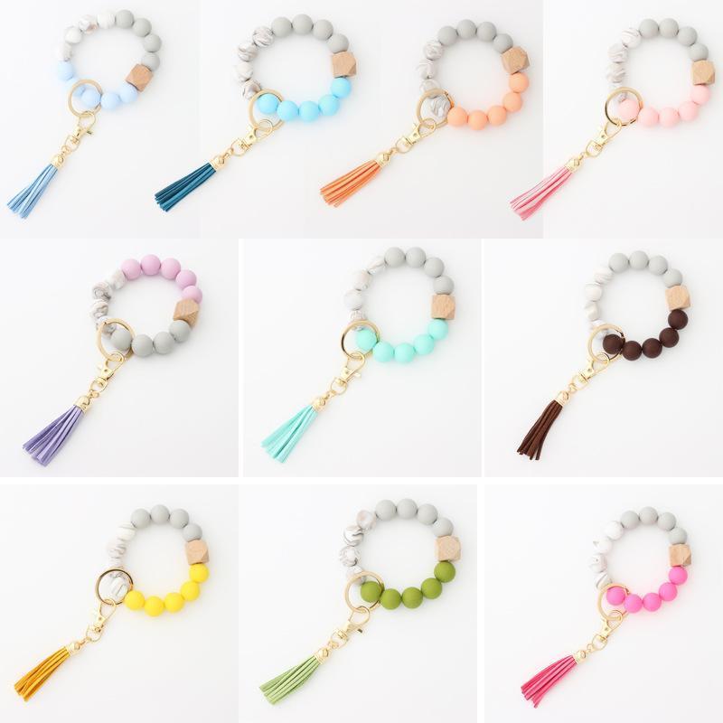 

Bead Keychain Wooden Tassel Bead String Chain Food Grade Silicone Bead Bracelet Women Girl Key Ring Wrist Strap Bracelet Keychain