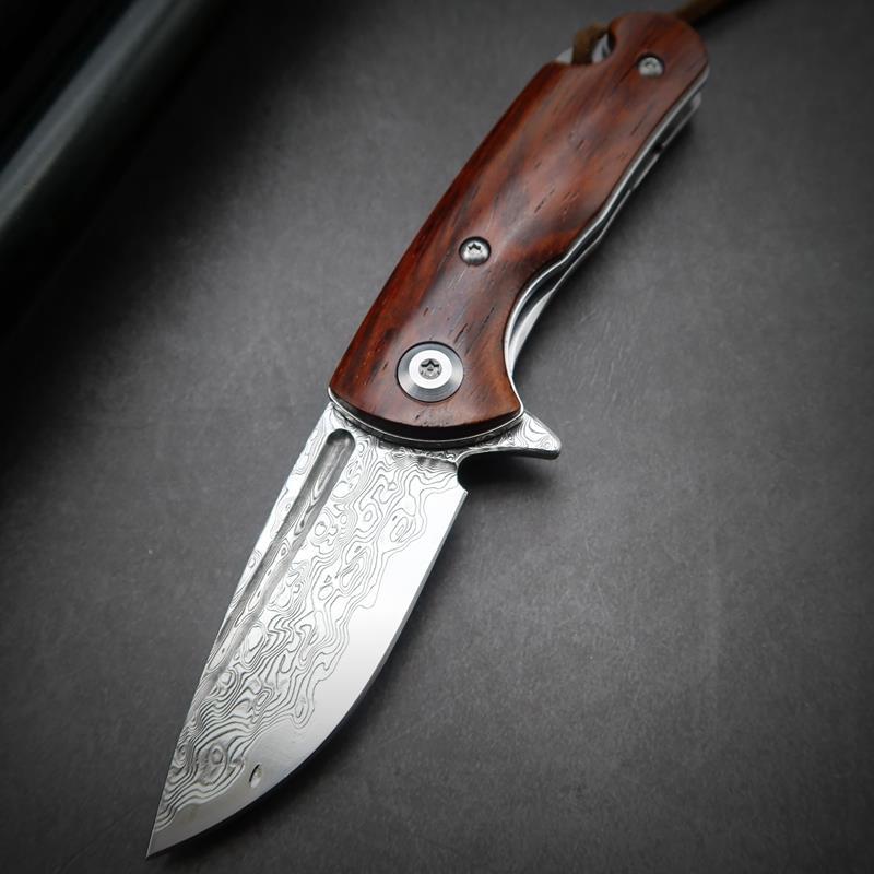 

brown wood handle damascus blade folding pocket knife