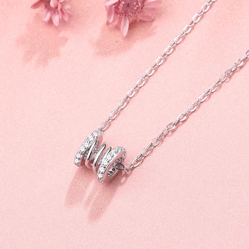 

Stainless steel necklace female light luxury new creative spring, hollow pendant with luxurious diamonds on both sides, fashionable style ic