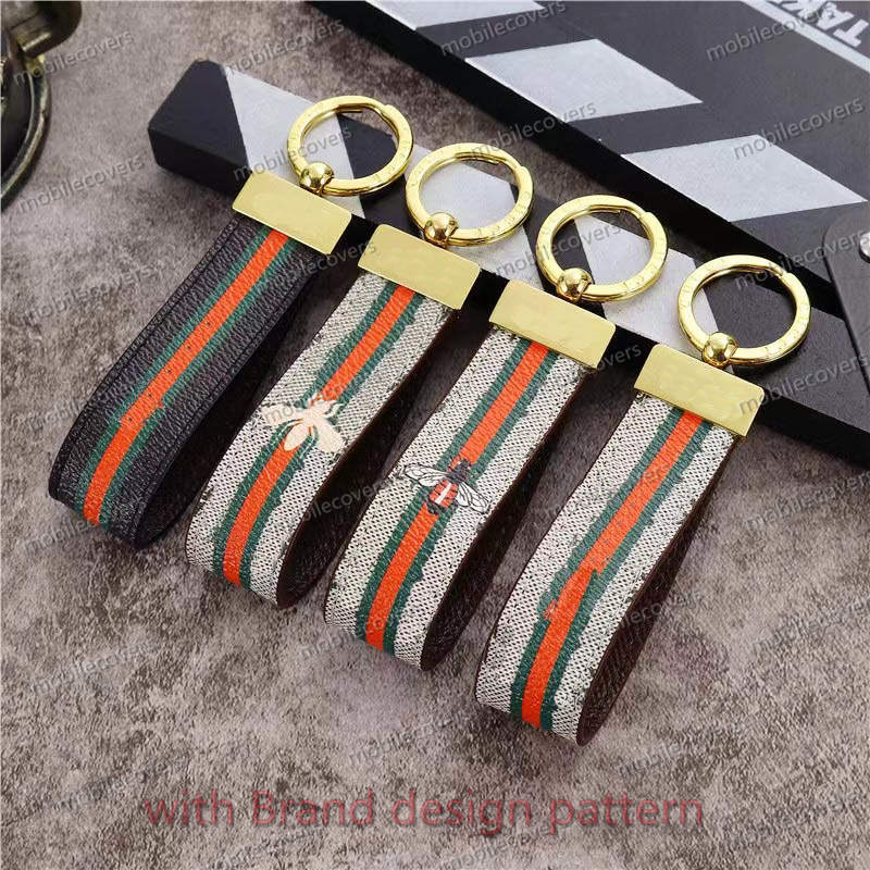 

G design Cell Phone Accessories cases Key chain Buckle lovers Car Keychain Handmade Leather Designers Keychains Men Women Bag Pendant 6Color, Colorful g logo