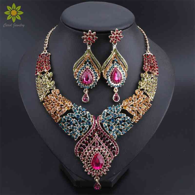 

Gold Color Multicolor Crystal Rhinestones Feather shaped Necklace Earrings Set African Bridal Jewelry Sets, Silver