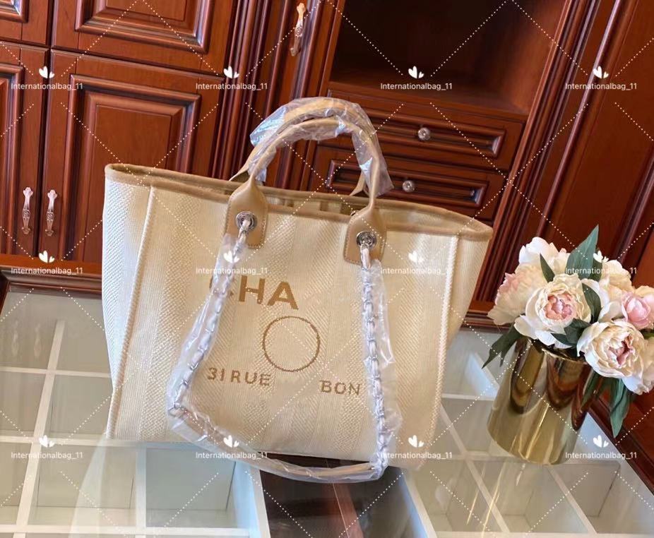 

Brand designed ladies shoulder crossbody bags stylish large volume canvas woven tote with leather chain shopping beach bag multi-color options