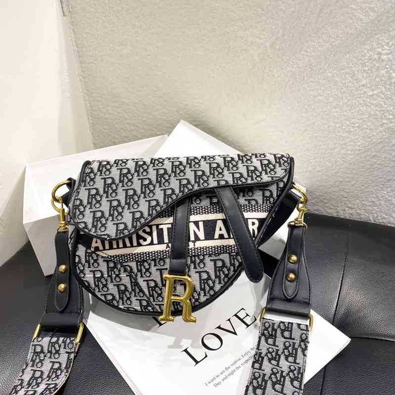 

Design Bag new fashion women's pistol one shoulder straddle handbag Handbags