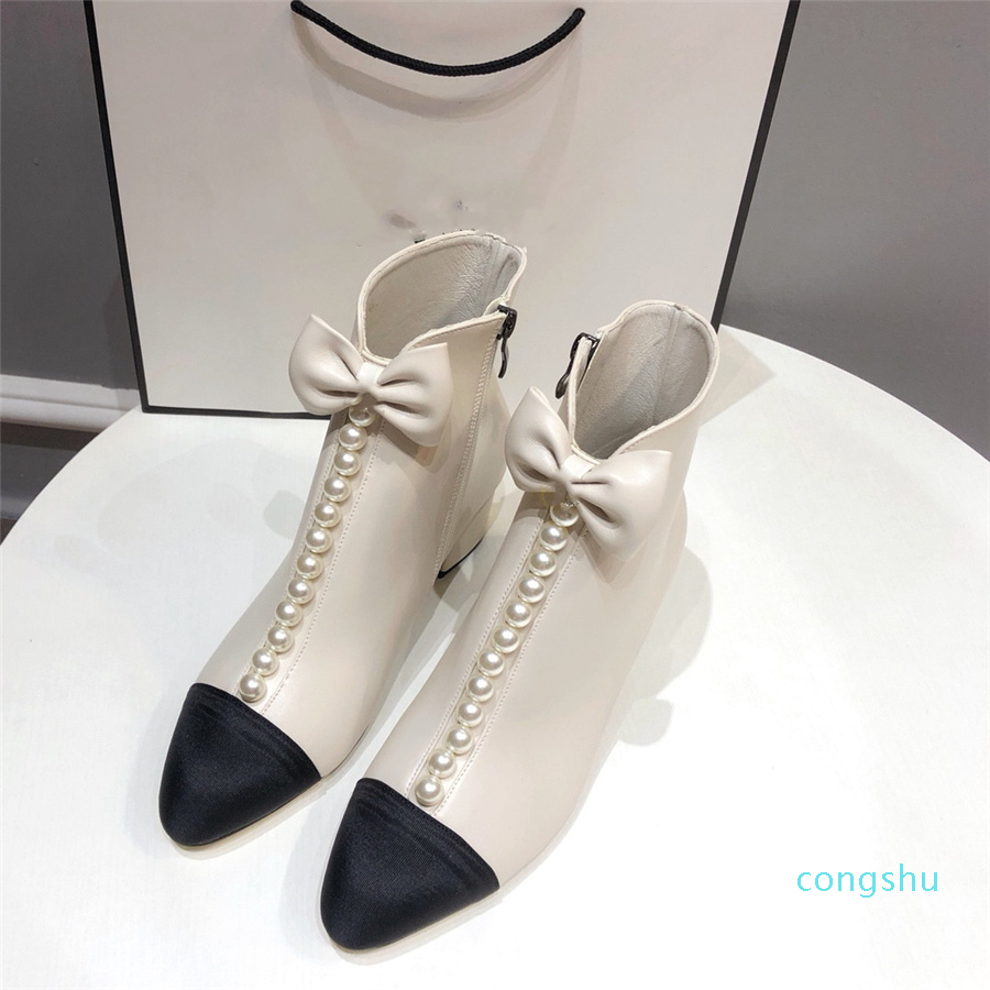 Nouveau hiver haut talon et épais avec des bottes courtes manquer Big aristocratique palais de la mode vent petit princesse fille coeur coeur arc