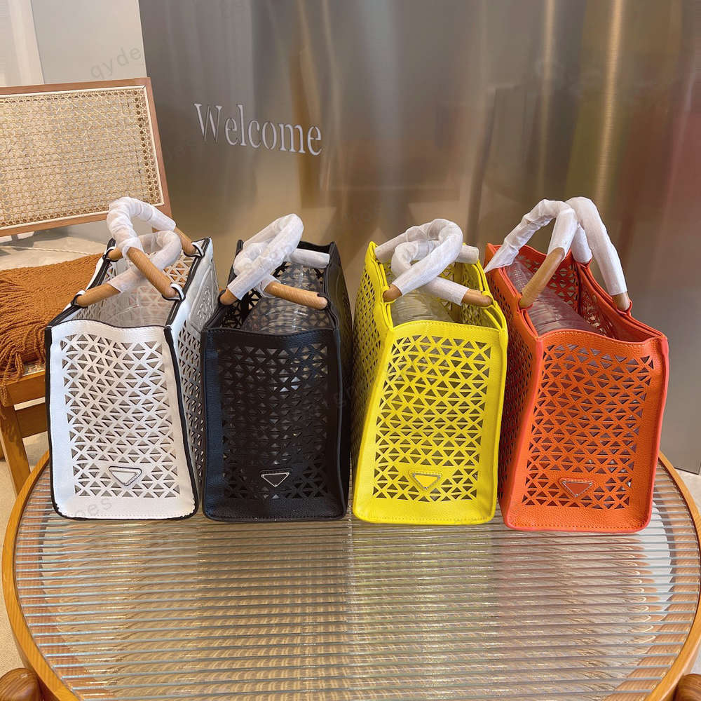 

Designer women's summer vacation series four-color hollow tote handbag size 30*16*25cm, For transportation