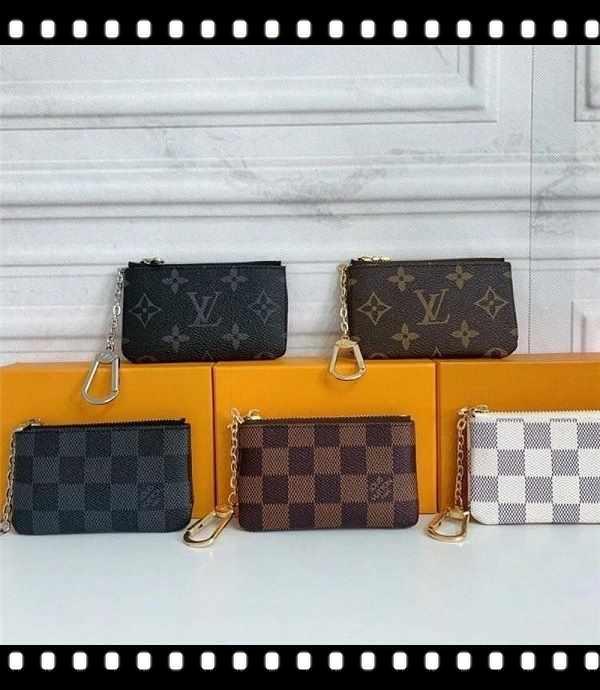 

Luxurys Designer bag Men's and women's wallets leather short coin purse fashion buckle wallet men's LV LOUIS car