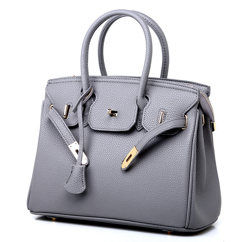Guangzhou Women's 2021 Fashion Litchi Pattern Straddle One Shoulder Women's Handbag-image-725518482
