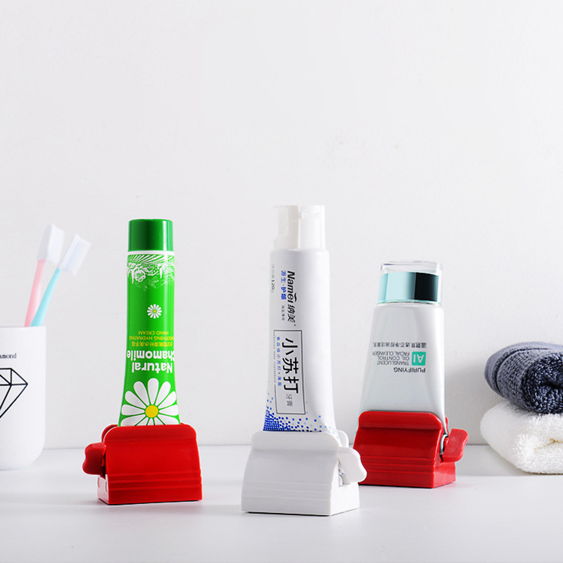 

Freeshipping Toothpaste Device energy saving Multifunctional Toothpaste Dispenser Facial Cleanser Squeezer Clips Manual Lazy Tube Press