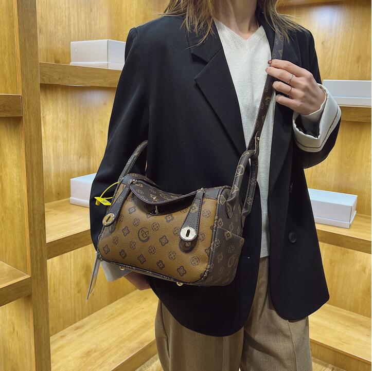 

Wholesale ladies shoulder bags street trend printed pillow bag elegant atmosphere old color leather handbag European and American popular contrast women backpack, Coffee-6113