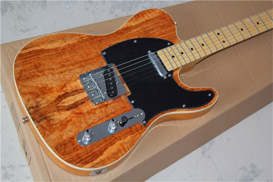 

Telecast Guitar Mahogany Body Rosewood Fingerboard Chrome Hardware Black Pickguard