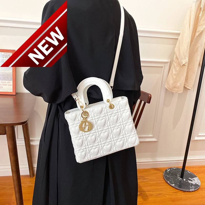 NEW NET NET FEMME Même type de princesse Diana Sac Sac Fashion Style étranger Portable Petite Square Texture Polyatile Messenger