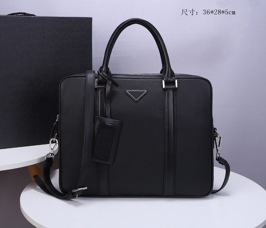 

2021 Unisex Leather Black Designer Briefcase High Quality Large Capacity Laptop Bag Retro Fashion Waterproof Handbag Office Casual Two Colors