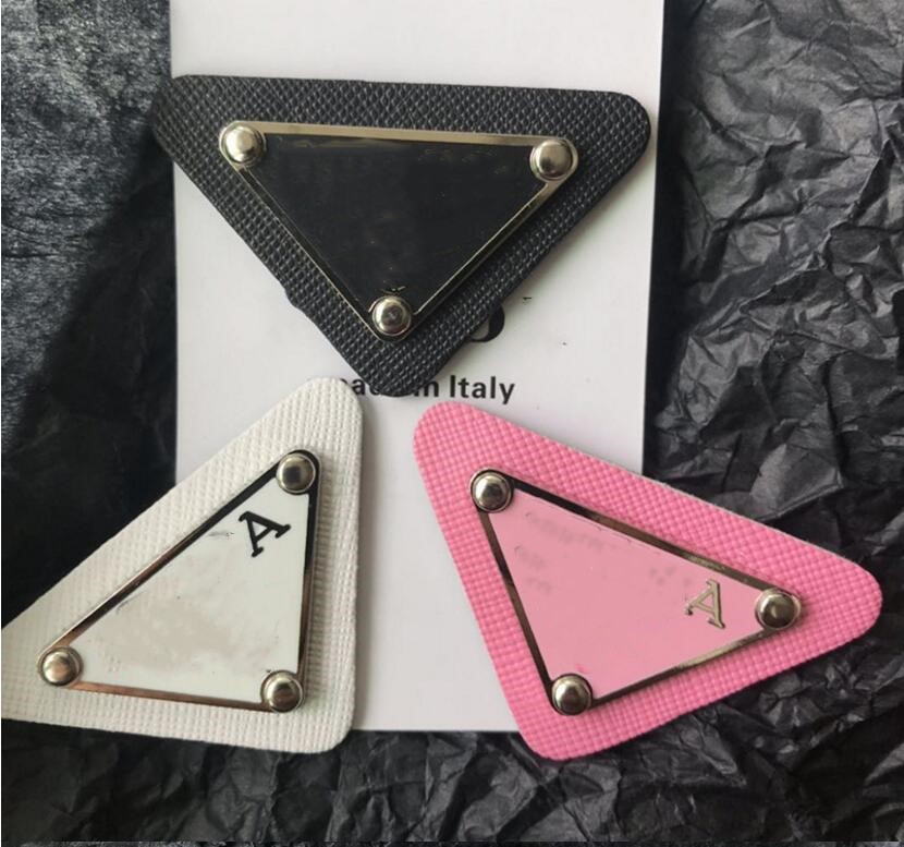 

2021 Japanese and Korean triangle letter brooch fashion clothes hat temperament accessories hair tie women high quality fast delivery