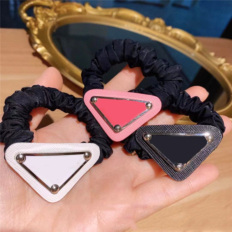 

Trendy Designer Hair Rubber Bands Metal Triangle Letter Hairpin Women Hairbands