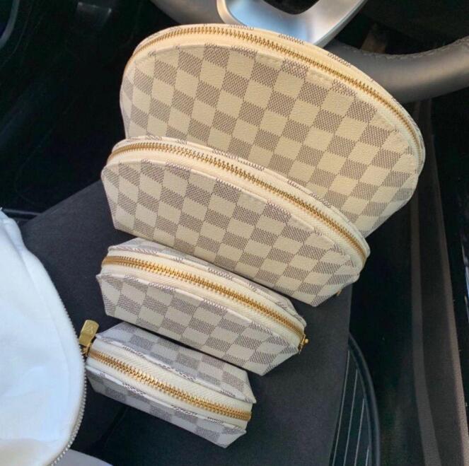 

GGLVLouisVitton YSLVUTTON 4pcs set cosmetic bags travel make up bag Angels ladies cluch purses organizador toiletry Bag, Size: 15*7*21 cm
