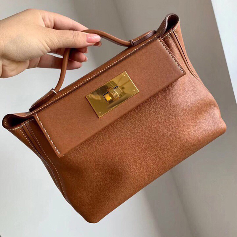 

2021 one-shoulder bag head layer cowhide dumpling wing crossbody portable female wild fashion niche luxury trend, Sky blue