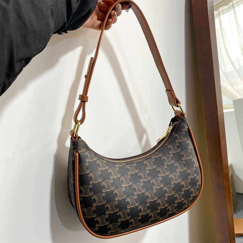

Luxury design handbag 2021 new net red same triumphal arch underarm single shoulder French stick old flower crescent handbag, White