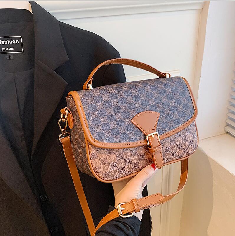 

Wholesale factory women leathers shoulder bags printed in winter fashion underarm bag vintage leather handbag flip color matching elegant handbags