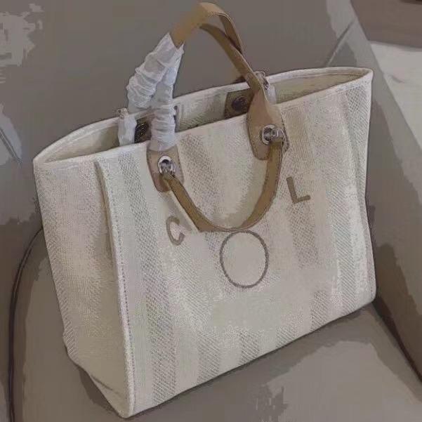 

Luxury Designer Beach Bags 2021 Fashion Classic Leather Handle Patchwork Canvas Large Capacity Mommy Bag Shopping Tote High Quality