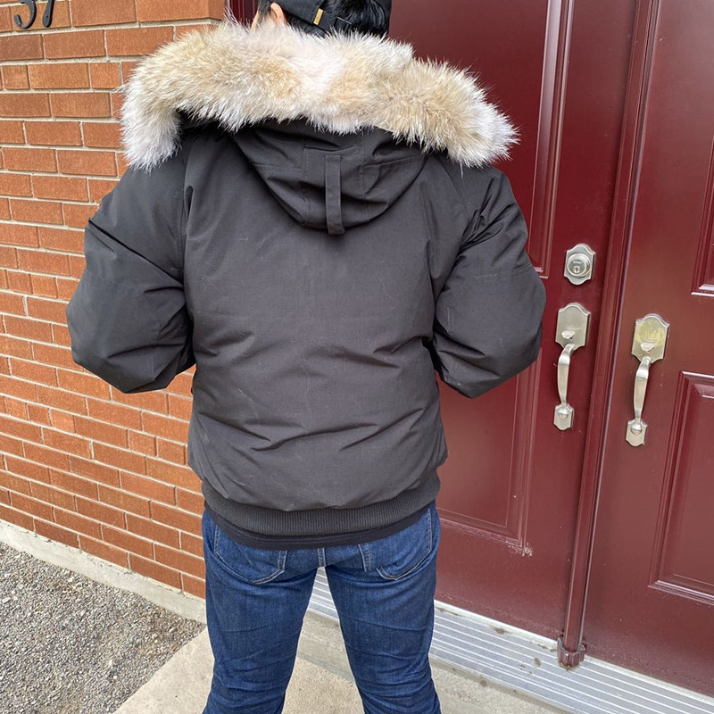

black CHILLIWACK bomber parkas with coyote fur trim 625 white duck men down jackets ykk zipper