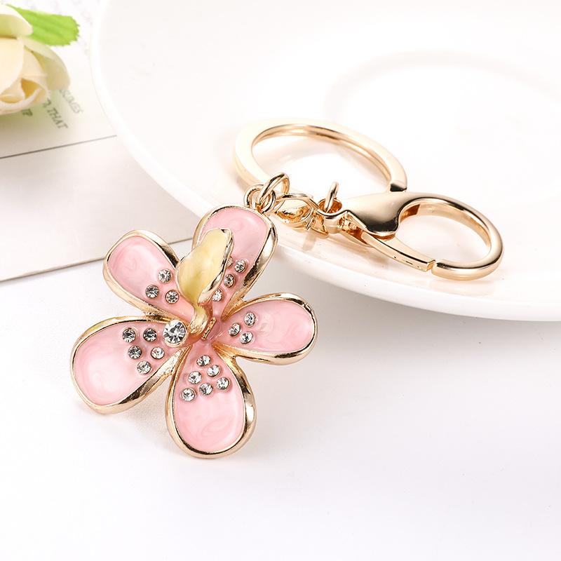 

Keychains Sell Korean Creative Small Fresh Oil Drop Flower Key Ring Daisy Bag Pendant Gift Chain