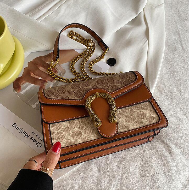 

Factory Outlet women shoulder bags sweet and lovely polka dot handbags personality golden hasp chain bag street trend contrast leather handbag