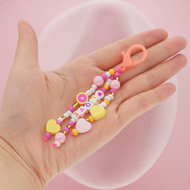 

Keychains Lovely Pink Yellow Soft Pottery Love Heart-Shaped Letter Rice Beads Imitation Pearl Keychain Women's Jewelry Accessory