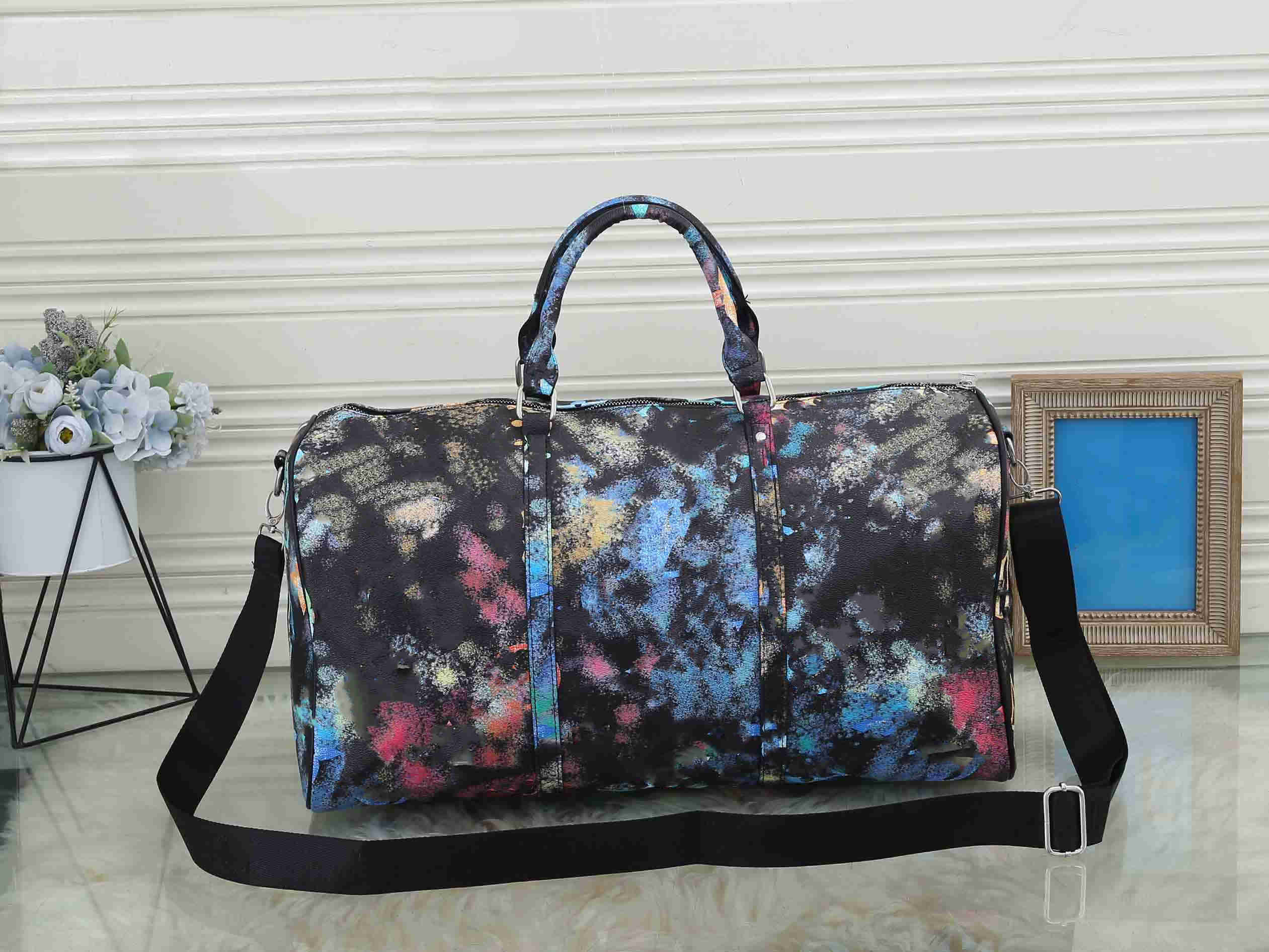 

50CM large capacity duffel bags camouflage Two color splicing women men travel bag hotes sale quality shoulder carry on luggage bottom rivets hote handbag, Chocolate