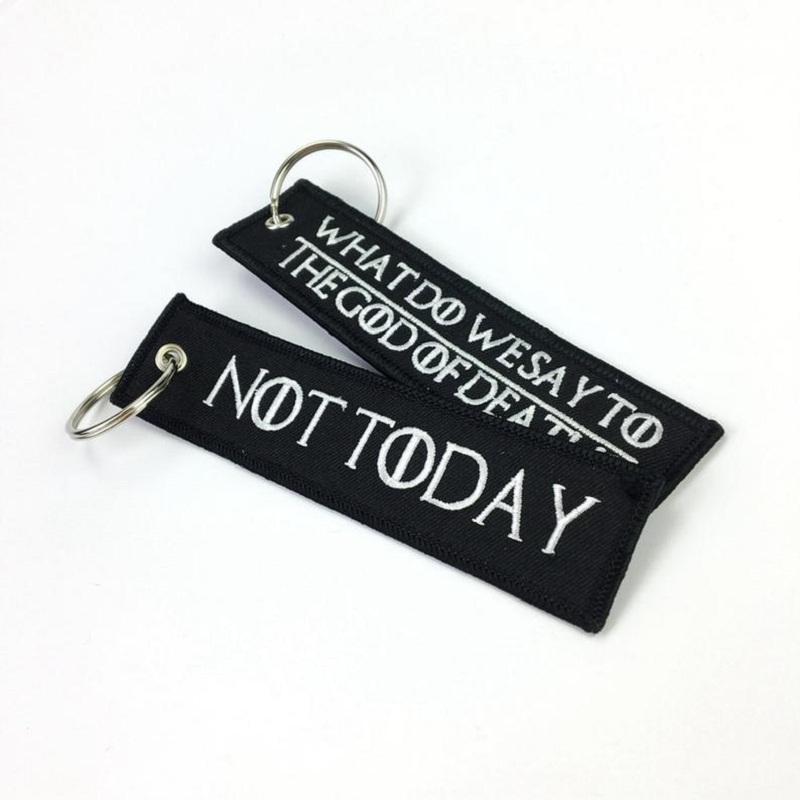 

Keychains WHAT DO WE SAY TO THE GOD OF DEATH Keychain For Motorcycles And Cars Embroidery OEM Key Chain Keyring Tags Fashion Llaveros