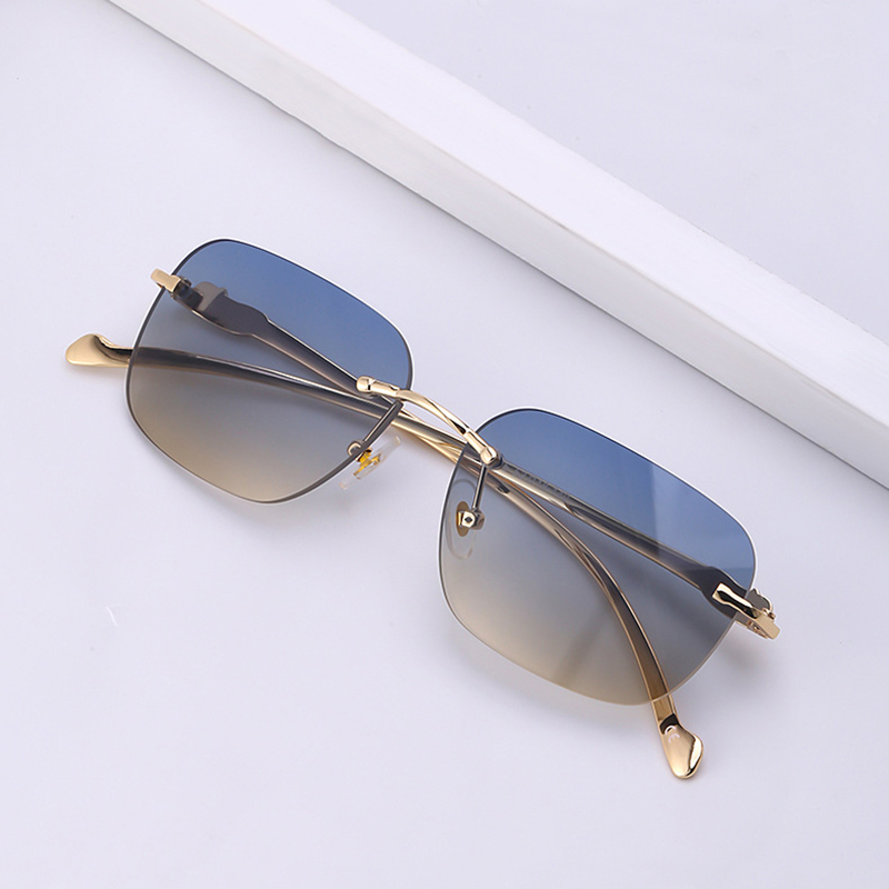 

Women's Fashion Rimless Sunglasses Ultra Light High Quality Driving UV Protective Glasses